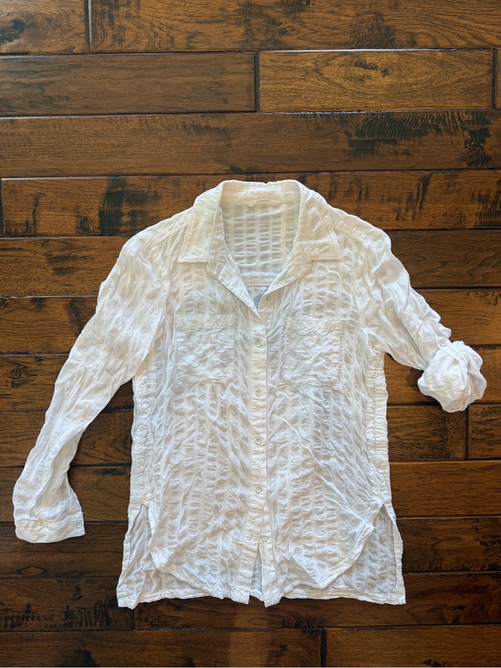 Athleta crinkle fabric long sleeve white button up.